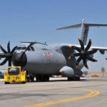 A400M being moved into place. Aircraft is on track for static engine ground run in November with FADEC software. Full Authority Digital Engine (or Electronics) Control software is a system that controls all aspects of aircraft engine performance. As of the end of September, the basic engine test run has achieved 3,150 hours with first flight clearance achieved. <br />Credit: EADS A400M