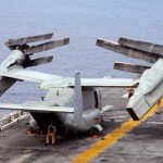 Sailors aboard the multi-purpose amphibious assault ship USS Bataan and embarked Marines from the 22nd Marine Expeditionary Unit, position the rotors of an MV-22B Osprey attached to Marine Medium Tiltrotor Squadron 263 (Reinforced), prior to the flight operations.<br /><em>Credits: USN Visual News Service, 10/2/09</em> MV-22B Osprey