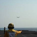 Flight deck officer directs Osprey landing on HMS Illustrious, July 2007<br />Source: SLDinfo.com Osprey landing on HMS Illustrious