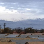 The sun attempts to shine through the clouds onto the mountains in Afghanistan Nov. 9. The high altitude of the Hindu Kush mountain range creates a harsh climate ranging from more than 100 degrees Fahrenheit in the summer to below-freezing temperatures in the winter.<em>Credit: 455th Air Expeditionary Wing, 11/9/09, Location: Bagram Airfield, Afghanistan</em> Afghan Terrain