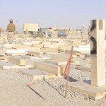 Seabees assigned to Naval Construction Battalion 22 inspect and raise center posts that will support a Southwest Asia Hut under construction at Kandahar Airfield, Afghanistan. NMCB 22, homeported in Fort Worth, Texas, is deployed to southern Afghanistan in support of Operation Enduring Freedom.<em>Credits: 30th Naval Construction Regiment, 10/9/09, Location: Kandahar Airfield, Afghanistan</em> Building at Kandahar