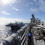 The British oiler HNLMS Amsterdam (A 836) (center) performs a replenishment at sea with the multi-purpose amphibious assault ship USS Wasp (LHD 1) (right) and the British frigate HMS Iron Duke (F 234). Wasp is currently deployed on Southern Partnership Station-Amphib with Destroyer Squadron 40 and embarked Security Cooperation Marine Air-Ground Task Force. <em>Credit: USS WASP, 11/9/09, Location: CARIBBEAN SEA , At Sea</em> HNLMS Amsterdam