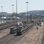More than 3,800 Soldiers from the 3rd Brigade Combat Team, 4th Infantry Division, including supporting elements from units across Fort Carson, prepared, inspected and rail loaded 1,170 tactical vehicles and pieces of equipment for an upcoming rotation to the National Training Center in Fort Irwin, California and then for their deploy in support of Operation Iraqi Freedom.<em>Credit: Headquarters, 4th Infantry Division Public Affairs, 10/23/09, Location: Fort Carson, US</em> Iron Brigade Hits the Tracks