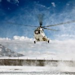 A Russian made Mil Mi-8 helicopter prepares to land at Forward Operating Base Airborne, Afghanistan, after a two-day snow storm, Nov. 25. The civilian operated helicopter brings mail and supplies to Soldiers at FOB Airborne. <br /><em>Credit: Joint Combat Camera Afghanistan, 11/25/09, Location: FORWARD OPERATING BASE AIRBORNE, Afghanistan</em> MI-8 Lands in Snow Storm