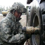 Sgt. Oleria Robertson, a heavy vehicle driver with the 396th Transportation Company, 260th Combat Sustainment Support Battalion, 96th Sustainment Brigade, 13th Sustainment Command (Expeditionary), changes a spare tire on her Palletized Loading System trailer, during No Move Day training. The 396th Transportation Co. uses all no move days to train and evaluate Soldier common task proficiency to ensure safety and mission success on the roads of Iraq. <br /><em>Credit: 13th Sustainment Command (Expeditionary), 12/6/09, Location: CAMP LIBERTY, Iraq</em> No Move Training