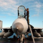 Airman Apprentice Herbert Counts, Plane captain Aviation Ordnanceman, performs routine maintenance on an F/A-18E Super Hornet from the Royal Maces of Strike Fighter Squadron (VFA) 27 aboard the aircraft carrier USS George Washington (CVN 73). George Washington, the Navy's only permanently forward deployed aircraft carrier, is underway in the western Pacific Ocean.<em>Credit: Navy Visual News Service, 11/6/09M</em> Performing Routine Maintainance on the F-18 at Sea