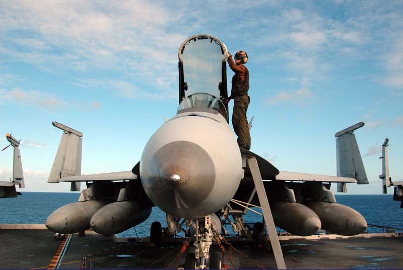 Performing-Routine-Maintainance-on-the-F-18-at-Sea.jpg
