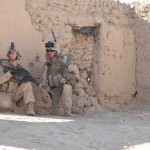 Lance Cpl. Irving Reyes, right, and Seaman David E. Shepardson, both assigned to India Company, 3rd Battalion, 4th Marine Regiment, provide security during a wheat seed distribution project. <br /><em>Credit: US Navy Visual News Service, Courtesy Photo, 11/12/09, Location: DELARAM, Afghanistan</em> Providing Security