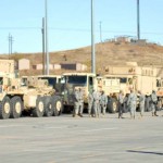 Soldiers of 3rd Brigade Combat Team, 4th Infantry Division line up some of the brigade's 1,170 tactical vehicles at Fort Carson's deployment readiness reaction field to be loaded on the train that will transport the vehicles to the National Training Center in Fort Irwin, Calif. The Soldiers of 3rd BCT are deploying in support of Operation Iraqi Freedom.<em>Credit: Headquarters, 4th Infantry Division Public Affairs, 10/23/09, Location: Fort Carson, US</em> Trucks Being Prepared for Transit