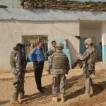 <p>Staff Sgt. Allan Huhn (middle right), a Westville, N.J., native and a squad leader with 218th Military Police Company, stands outside of an Emergency Services Unit building in Hawijah, Iraq, Nov. 6 with some of the ESU that work there. Huhn and his squad have been involved in training the ESU, and many officers in the Iraqi police, on numerous policing subjects.</p><p>While most missions in Iraq are run at a platoon level, with a junior commissioned officer platoon leader that plans and directs missions, and a platoon sergeant—normally a sergeant first class—resourcing and executing; some special groups, such as MPs, have to operate on a much smaller level, with individual squads within a platoon conducting missions independently. </p><p>According to Huhn, he and his squad have worked with Iraqi police on a regular basis since their arrival in Iraq earlier this year. They have already been involved in training IP in numerous policing tasks including: vehicle searches, weapons cleaning, investigative training, weapons ranges, sensitive items inventories, detainee abuse prevention, fingerprinting, community policing and basic medical skills, to name a few. Huhn also regularly supports missions of the IP at their request. </p><p><em>Credit: 2nd Brigade Combat Team, 1st Cavalry Division Public Affairs, 11/6/09, Location: Kirkuk, Iraq</em></p> Working with Iraqi ESU