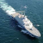 The littoral combat ship USS Freedom conducts flight deck certification with an MH-60S Sea Hawk helicopter assigned to the Sea Knights of Helicopter Sea Combat Squadron 22. With the flight decks and hangars onboard the USS Freedom, the ship can carry either two helicopters or one helicopter and three unmanned aerial vehicles. <br />Source: USN Naval Visual Service 9/28/09 Littoral combat ship USS Freedom