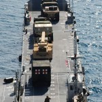 USMC offload at Souda Bay, Greece. Sea-based vehicles are transported off of a transport ship as part of Maritime Pre-positioning Force Offload 2009. The exercise is conducted by Marines and Sailors of U.S. Marine Corps Forces Europe and other participating units in order to test and refine the logistics of providing a robust forward presence in its area of operations. <br />Credit: USMC Forces Europe 9/13/09 USMC offload at Souda Bay, Greece