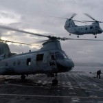 CH-46 Sea Knight helicopters assigned to the 31st Marine Expeditionary Unit land on the flight deck of the amphibious transport dock ship USS Denver. Denver is the lead ship of the Denver Amphibious Ready Group and is conducting Amphibious Integration Training with the 31st Marine Expeditionary Unit off the coast of Okinawa, Japan, in preparation for fall patrol. <br /> Credit: Naval Visual News Service 9/28/09 CH-46 Sea Knight helicopters