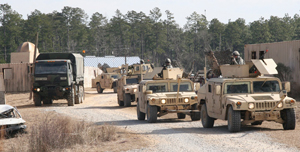 Camp Shelby Combat Outpost Situational Exercise Soldiers of Alpha Troop, 1/278th Armored Combat Regiment, Tennessee National Guard, move into the mock city of Aljaffah located at Camp Shelby Joint Forces Training Center, Camp Shelby, Miss., while performing convoy operations training. The 278th is scheduled to leave for Iraq in early spring for their convoy security mission. (Courtesy: U.S. Army photo by Staff Sgt. Tekecia Simpson, 177th Armored Brigade, January 14th, 2010)