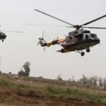Iraqi Army helicopter and Black Hawk train at Camp Taji, Iraq (Credit Photo: Agence France-Presse, Defense News) Iraqi Army helicopter and Black Hawk train at Camp Taji, Iraq (Credit Photo: Agence France-Presse, Defense News)