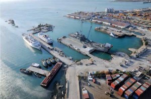 United States Army and Navy units arrived mid-January and immediately began conducting Joint Logistics Over The Shore. "The great benefit of JLOTS during this operation was two-fold," said Col. Charles Maskell, commander, 7th Sustainment Brigade. "First, it allowed us to bring in life saving aid over the shore when it was most needed and the port was unavailable. Secondly, it took pressure off the port's South pier so that the Army divers and Navy underwater construction Sailors could reinforce it. The repair of the South pier may be our most lasting legacy at the main seaport in Port au Prince." (Credit Photo: 7th Sustainment Brigade) Figure 2 United States Army and Navy units arrived mid-January and immediately began conducting Joint Logistics Over The Shore. "The great benefit of JLOTS during this operation was two-fold," said Col. Charles Maskell, commander, 7th Sustainment Brigade. "First, it allowed us to bring in life saving aid over the shore when it was most needed and the port was unavailable. Secondly, it took pressure off the port's South pier so that the Army divers and Navy underwater construction Sailors could reinforce it. The repair of the South pier may be our most lasting legacy at the main seaport in Port au Prince." (Credit Photo: 7th Sustainment Brigade)