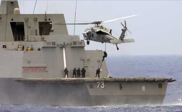 US Coast Guardsmen embarked aboard the littoral combat ship USS Freedom conducting a fast-rope descent from an MH-60S Sea Hawk helicopter onto the flight deck of the Republic of Singapore Navy stealth multi-mission frigate RSS Supreme during a maritime security exercise (Credit Photo: USN Visual Service, July 9, 2010) US Coast Guardsmen embarked aboard the littoral combat ship USS Freedom conducting a fast-rope descent from an MH-60S Sea Hawk helicopter onto the flight deck of the Republic of Singapore Navy stealth multi-mission frigate RSS Supreme during a maritime security exercise (Credit Photo: USN Visual Service, July 9, 2010)