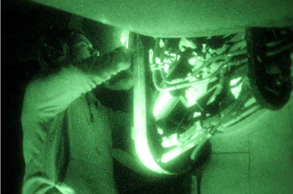 Maintenance is a 24/7 demand. Maintaining at Night in Afghanistan (Credit: USMC)