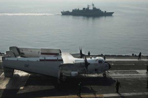 The Australian navy minesweeper HMAS Towoomba (FFH-156) is underway alongside the aircraft carrier USS Nimitz (CVN 68). (Credit: USS Nimitz 10/28/09) The Australian navy minesweeper HMAS Towoomba (FFH-156) is underway alongside the aircraft carrier USS Nimitz (CVN 68). (Credit: USS Nimitz 10/28/09)