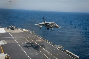 An Italian AV-8 Harrier lands on the deck of the Italian navy ship ITS Cavour during Brilliant Mariner Exercise 13. The exercise includes a total of 13 allies testing capabilities such as replenishment at sea, medical evacuation and vessel boarding as well as air defense and anti-surface naval artillery. Brilliant Mariner runs from Sept. 23 through Oct. 6. Credit Photo: NATO