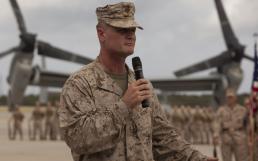 Brig. Gen. Steven R. Rudder addresses the crowd Aug. 30 during the Marine Medium Tiltrotor Squadron 262 redesignation ceremony at Marine Corps Air Station Futenma. The redesignation symbolized the squadron's transition from CH-46E Sea Knight helicopters to MV-22B Osprey tiltrotor aircraft and the improvement of III Marine Expeditionary Force operational agility. VMM-262 is a part of Marine Aircraft Group 36, 1st Marine Aircraft Wing, III MEF. Rudder is the commanding general of 1st MAW. Photo by Cpl. Matthew J. Manning