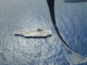 Part of the Hub is the USS George Washington here playing the role of the landing deck for the Osprey coming in for refueling. Credit: Lt. Col. Brown