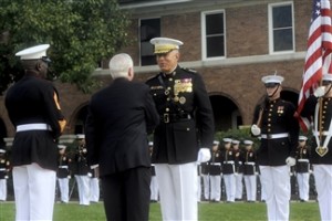 Secretary of Defense Robert M. Gates presents an award to Gen. James T. Conway during a Passage of Command of the United States Marine Corps ceremony at the Marine Barracks, Washington, D.C., on Oct. 22, 2010. Conway relinquished command as Commandant of the Marine Corps to Gen. James F. Amos in a ceremony presided over by Gates. DoD photo by Cherie Cullen
