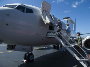 From left) General Hawk Carlisle, Pacific Air Forces commander; Mr. Scott Dewar, Australian Consul-General in Honolulu, Hawaii; and Maj. Gen. Kevin Pottinger, PACAF Chief of Operations, climb aboard a Royal Australian Air Force E-7A Wedgetail Airborne Early Warning & Control aircraft on the flightline at Joint Base Pearl Harbor-Hickam, Hawaii, August 26, 2013. The RAAF Wedgetail and crew were at JBPH-H on a stopover on the return home from participating in Red Flag-Alaska. AEW&C aircraft can control the tactical battle space, providing direction for fighter aircraft, surface combatants and land based elements, as well as supporting aircraft such as tankers and intelligence platforms. RAAF Wedgetail crew provided static displays and a familiarization flight to JBPH-H personnel, to familiarize Airmen with RAAF Wedgetail capabilities. (U.S. Air Force photo/Staff Sgt. Nathan Allen)