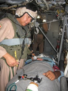 Chief Petty Officer Richard B. Guerrero, a Chief Hospital Corpsmen with Marine Medium Tiltrotor Squadron 263 (Reinforced), 22nd Marine Expeditionary Unit, cares for a patient aboard an MV-22B Osprey during an emergency medical evacuation June 25, 2009. The Sailor sustained head and hip injuries and was experiencing chest pains after falling while aboard USS Bataan (LHD 5). This is the first time the Osprey has been used to conduct an emergency evacuation from a U.S. Naval ship. (Official USMC photo)