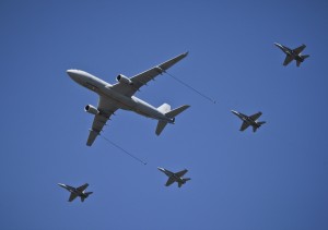 The four Hornets and the tanker are seen doing a demonstration at the Centenary of Military Aviation Air Show at RAAF Williams - Point Cook, commemorating 100 years of military aviation in Australia. The Air Show (held in early March 2014) commemorates a significant moment in Australias military aviation history when Lieutenant Eric Harrison, an aviation instructor with the Central Flying School, made Australias first military flight taking off from RAAF Williams - Point Cook in a Bristol Boxkite on 1 March 1914. In the future, the Aussie tanker could refuel Ospreys, F-18s and F-35Bs for the USMC. Credit: RAAF