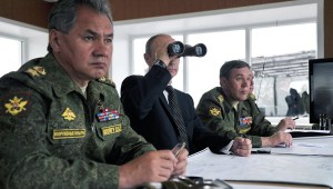 Russian defense minister Sergei Shoigu and president Vladimir Putin at the Tsugol military testing site. Credit: Novosti.