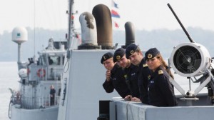Crew members of Norwegian minesweeper Otra stand on the bridge as they set sail together with Dutch minehunter Makkum, background, and three other ships of Belgium and Estonia from Kiel, Germany, Tuesday, April 22, 2014. The warships are part of the standing NATO Mine Counter-Measures Group ONE, one of NATO’s four standing Maritime Forces, deploying to the Baltic Sea to enhance maritime security and readiness in the region. The maritime Group was reactivated by a North Atlantic Council decision to enhance collective defense and assurance measures in response to the crisis in Ukraine. (AP Photo/Gero Breloer)The Associated Press