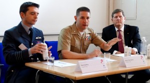 Lt. Col. Berke responds to a question from the audience at the Copenhagen Airpower Symposium. Berke is flanked by Group Captain Paul, Godfrey, RAF, and John Blackburn, Williams Foundation. Credit Photo: Second Line of Defense