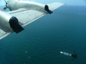 A MK 62 Quick Strike mine is deployed from the starboard wing of a P-3C Orion. Credit Photo: US Navy