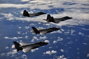 F-22 Raptors from the 94th Fighter Squadron, Joint Base Langley-Eustis, Va., and F-35A Lightning IIs from the 58th Fighter Squadron, Eglin Air Force Base, Fla., fly in formation after completing an integration training mission over the Eglin Training Range, Fla., Nov. 5, 2014. It was the first operational integration training mission for the Air Force’s fifth generation aircraft. The F-35s and F-22s flew offensive counter air, defensive counter air and interdiction missions together, employing tactics to maximize their fifth-generation capabilities. (U.S. Air Force photo/Master Sgt. Shane A. Cuomo)