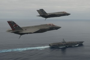 CF-03 Flt 193 (Mr. Elliott Clemence) and CF-05 Flt 100 (LCDR Theodore Dyckman) perform a flyover of the USS Nimitz during CVN DT-1.