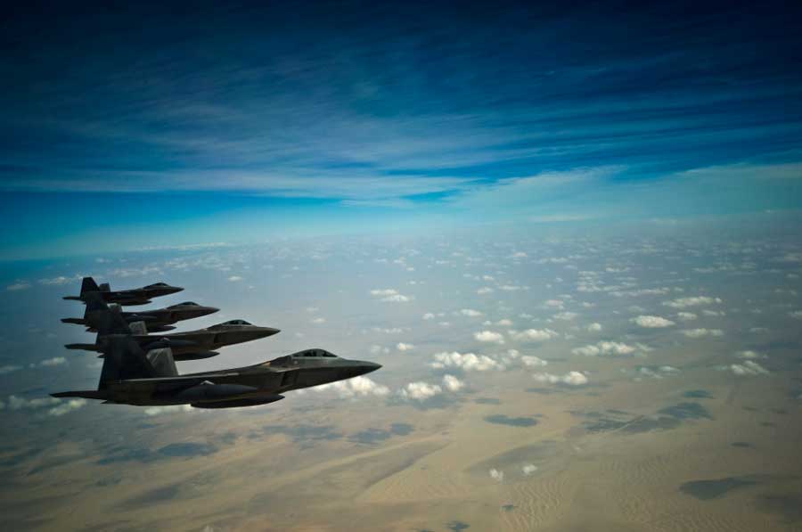 F-22 Raptors fly in formation during a training mission Dec. 9, 2009. The F-22s and crews are deployed from the 27th Fighter Squadron at Langley Air Force Base, Va., and in the U.S. Air Forces Central area of responsibility for the first time as part of a multinational exercise where aircrews from France, Jordan, Pakistan and England.  (Credit: http://www.af.mil/news/story.asp?id=123183141)