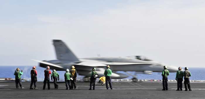 An F/A-18C Hornet assigned to the “Ragin Bulls” of Strike Fighter Squadron (VFA) 37 launches from USS Harry S. Truman (CVN 75) during routine flight operations. (Credit: USN Visual Service, 12/3/10)
