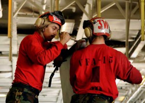 Aviation Ordnanceman 3rd Class Isaac Reyes (left) and Aviation Ordnanceman 2nd Class Charles Block prevent corrosion on an aircraft wing tip by performing daily maintenance checkups aboard USS Theodore Roosevelt (CVN 71). (Credit: USN Visual Service 1/15/09) Aviation Ordnanceman 3rd Class Isaac Reyes (left) and Aviation Ordnanceman 2nd Class Charles Block prevent corrosion on an aircraft wing tip by performing daily maintenance checkups aboard USS Theodore Roosevelt (CVN 71). (Credit: USN Visual Service 1/15/09)