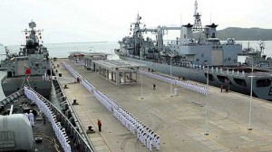 Chinese Navy ships moored at Sanya, in southern China's Hainan province. China's navy will move faster to build large combat warships, next-generation aircraft and sophisticated torpedoes in a modernizing overhaul for fighting in an era of information technology, its commander in chief said Thursday, April 16, 2009. (Credit: http://www.time.com/time/world/article/0,8599,1892954,00.html)