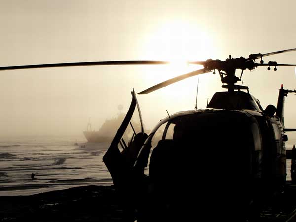A helicopter is seen operating in the Arctic.  Providing for maritime safety and security will be a core mission facing the 5 Arctic Council states.  Acquiring assets to operate in the Arctic will be crucial, and here Russia and Canada are clearly committed. The United States is not.