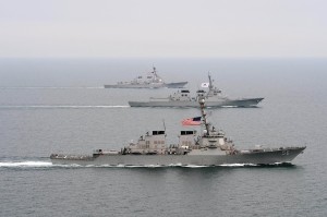 WATERS TO THE WEST OF THE KOREAN PENINSULA (March 17, 2013) The Arleigh Burke-class guided-missile destroyer USS John S. McCain (DDG 56), front, the Republic of Korea Navy Aegis-class destroyer ROKS Seoae-Yu-Seong-Ryong (DDG 993), middle, and the Arleigh Burke-class guided-missile destroyer USS McCampbell (DDG 85) move into formation during exercise Foal Eagle 2013. McCampbell and McCain are members of Destroyer Squadron 15, forward deployed to Yokosuka, Japan, and are underway to conduct exercise Foal Eagle 2013 with allied nation Republic of Korea in support of regional security and stability of the Asia-Pacific region. (U.S. Navy photo by Mass Communication Specialist 3rd Class Declan Barnes/Released) 