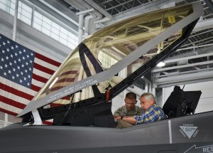 Tech. Sgt. Michael McClure, 33rd Aircraft Maintenance Squadron, briefs Defense Secretary Chuck Hagel on the cockpit of the F-35A Lightning II July 10 at Eglin Air Force Base, Fla. Hagel visited the base to tour the 33rd Fighter Wing and F-35 Lightning II integrated training center. He held a 45-minute troop call to praise the work of the service members who began and continue to improve the DOD’s newest fighter program. (U.S. Air Force photo/Linda Phillips) 