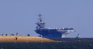 The USS Theodore Roosevelt was accompanied into Hampshire by its escort ship, the destroyer Winston S Churchill, which traditionally has a UK navigator on board to honour the ship's British connection and the post is currently being held by 27-year-old Lieutenant Lynsey Sewell. Credit: The Daily Mail 