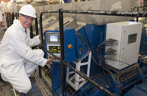 Seen here Philip Dunne MIN DP starts the generator. The first of HMS Queen Elizabeth’s mighty diesel generators was powered-up today marking a major milestone on the way to her becoming an operational warship ready to go to sea. The 65,000 tonne future flagship of the Royal Navy has undergone months of preparation work by the Aircraft Carrier Alliance (ACA) to start the first of her four diesel engines, which are directly coupled to the generators.  Together, each power unit weighs approximately 200 tonnes - the weight of two medium size passenger jets. Minister of State for Defence Procurement, Philip Dunne, officially started the first of the ship’s four diesel generators at the home of the UK’s aircraft carrier programme in Rosyth, Scotland today bringing the ship to life for the first time. Credit: UK MoD