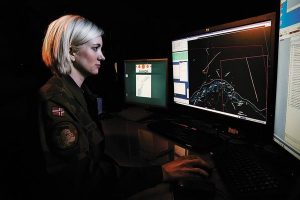 RNoAF 2nd Lt. Elsie Johnsen watches her radar screen as a pair of Norwegian F-16s extend greetings to two Russian Tu-95 Bears. Credit Photo: Norwegian Armed Forces