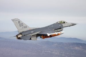 EDWARDS AIR FORCE BASE, Calif. -- A U.S. Air Force F-16 Fighting Falcon piloted by Maj. Jameel J. Janjua of the Royal Canadian Air Force carries a developmental test version of the Joint Strike Missile (JSM) to its release point above the Utah Test and Training Range west of Salk Lake City. When development is complete, the Joint Strike Missile is intended for use aboard the F-35 Lighting II Joint Strike Fighter. Janjua is assigned to the 416th Flight Test Squadron based at Edwards Air Force Base as part of an officer exchange program. (U.S. Air Force photo by Christopher Okula/Released) 