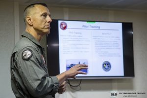 USMC Col. George “Sack” Rowell, Commanding Officer VMX-1 provides F-35B program status during "Proof of Concept" demonstration on USS America (LHA-6), November 18, 2016. 